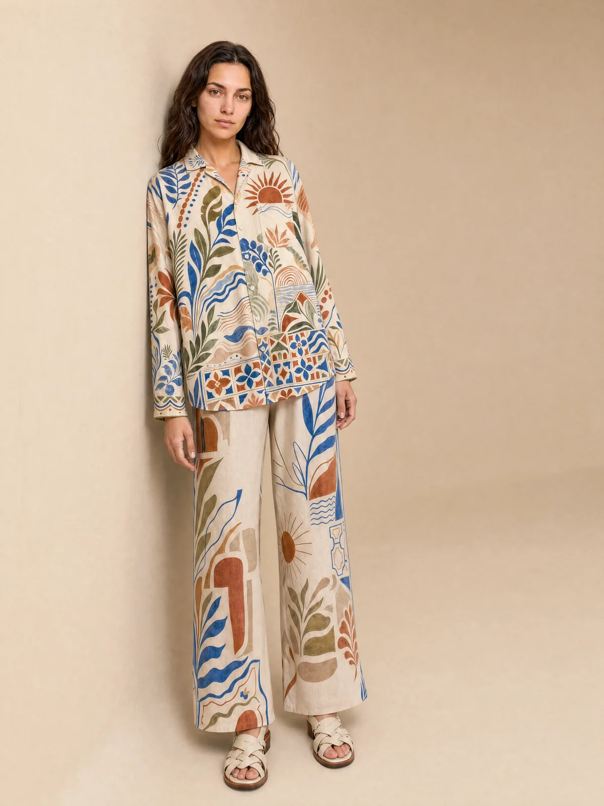 Full-body on-model image of a printed co-ord against a warm neutral backdrop