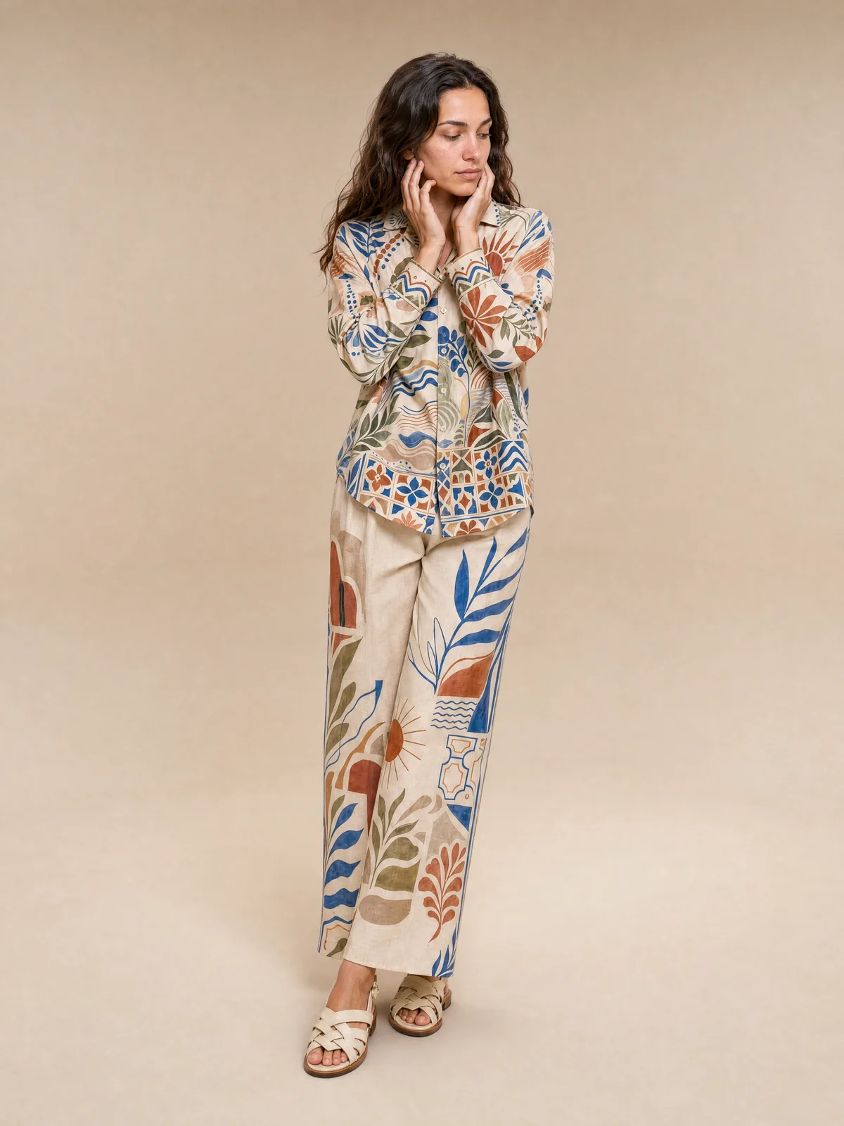 Profile on-model image of a printed co-ord with a directional editorial pose